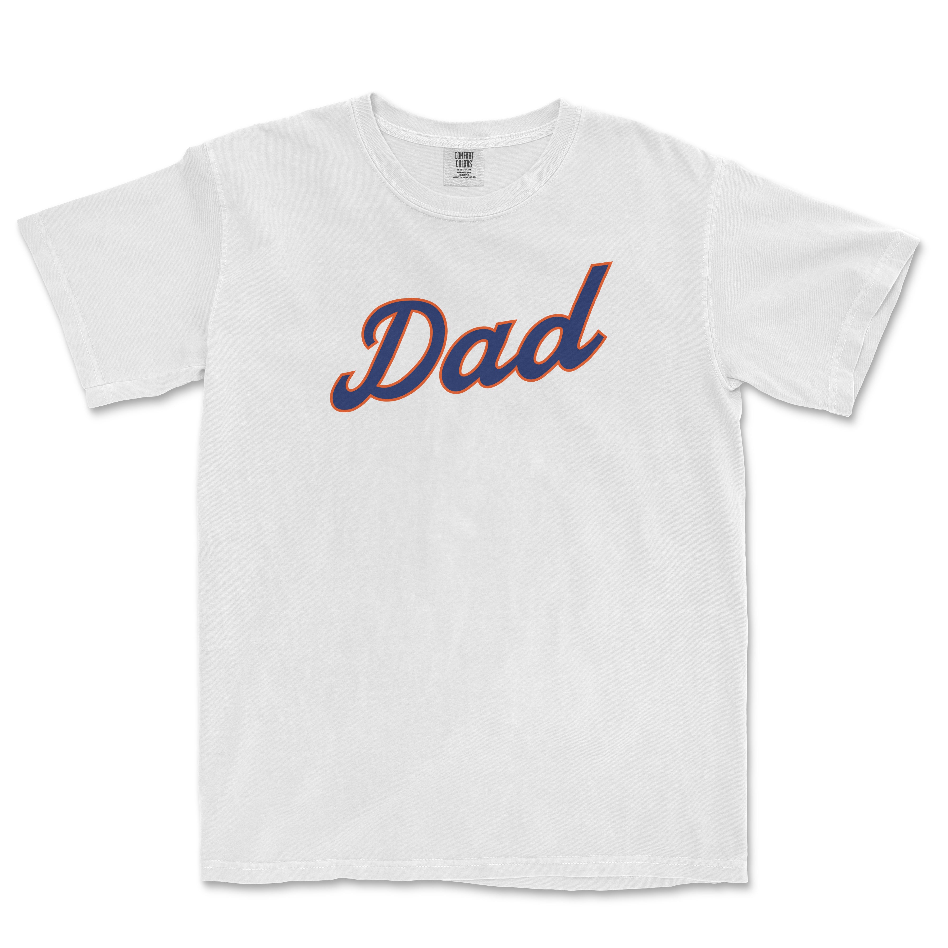White T-shirt with "Dad" written in bold, cursive navy and orange lettering across the front, celebrating baseball dads.