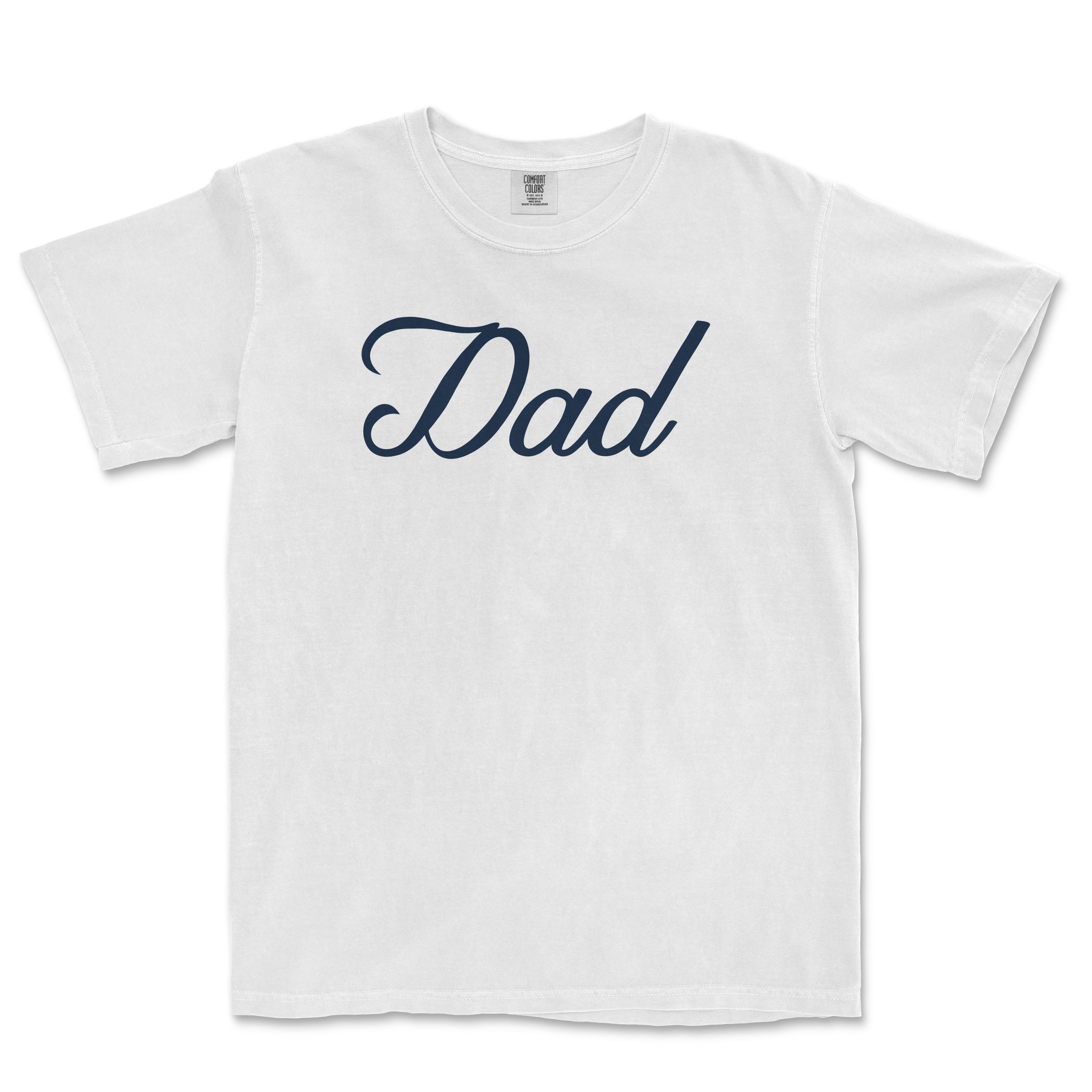 White Comfort Colors T-shirt with "Dad" printed in navy blue cursive font on the front, designed for a Bronx baseball dad.