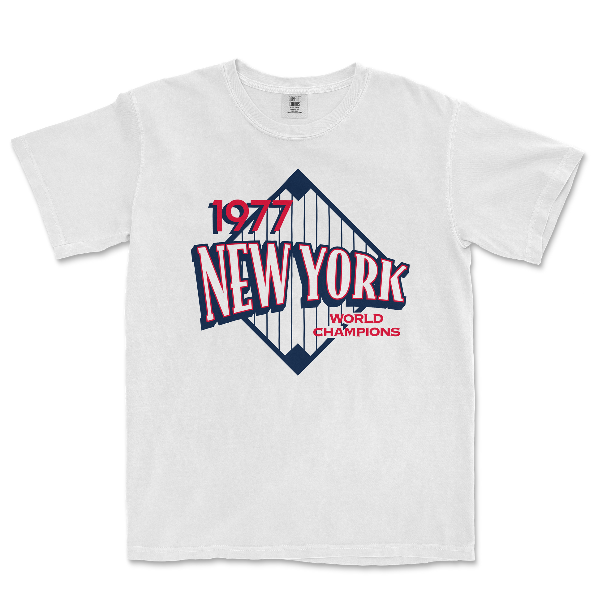 White Comfort Colors T-shirt featuring a vintage New York Yankees design with "1977 World Champions" text and a stylized baseball diamond graphic.