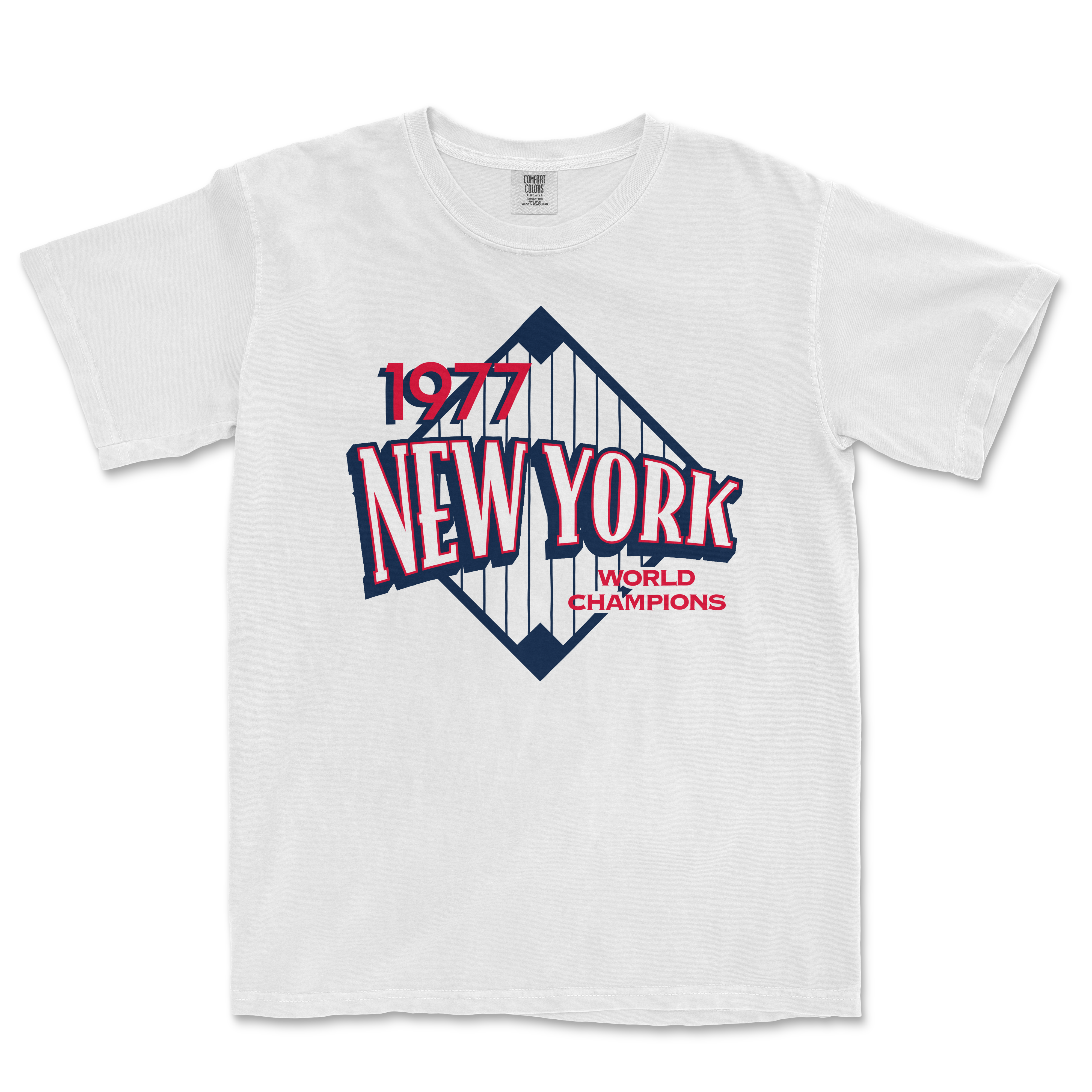 White Comfort Colors T-shirt featuring a vintage New York Yankees design with "1977 World Champions" text and a stylized baseball diamond graphic.