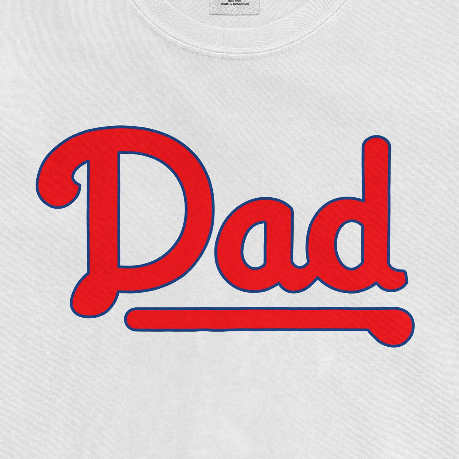 White T-shirt with bold red and blue text reading "Dad" in a playful font, designed for Philly baseball dads.