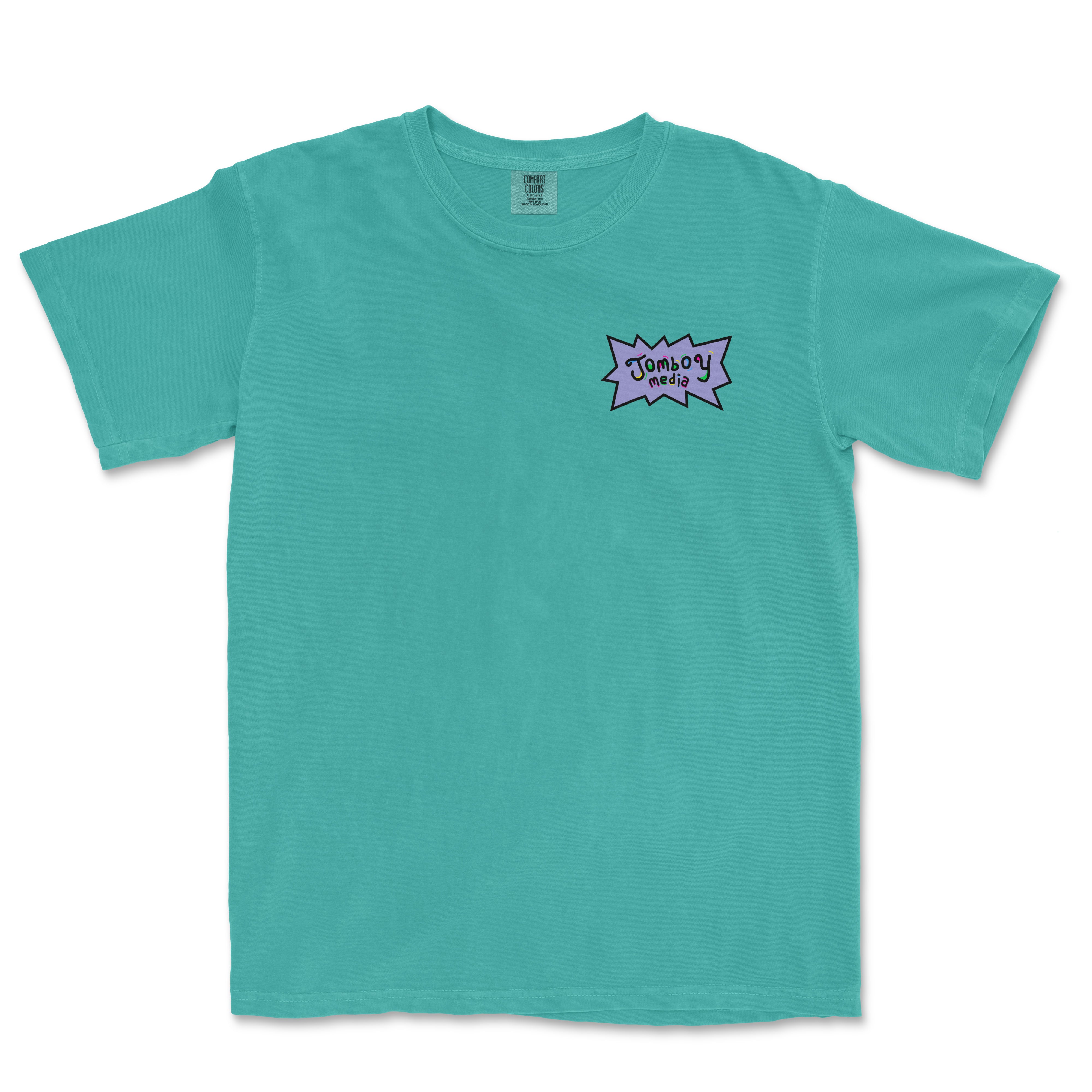 Turquoise Comfort Colors tee featuring a small "Jumboy Media" graphic on the chest with colorful text and a starburst background.