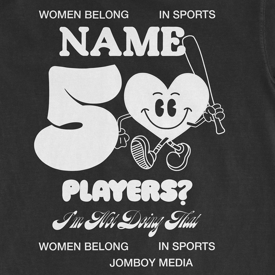 Comfort Colors black T-shirt featuring a playful cartoon heart character holding a fishing rod, with humorous text about women in sports.