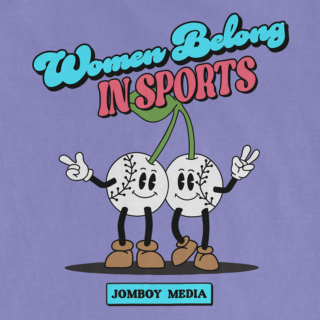 Illustration of two cartoon baseballs with smiling faces, arms, and legs, holding up peace signs, with the text "Women Belong in Sports" above and "Jombo Media" below.
