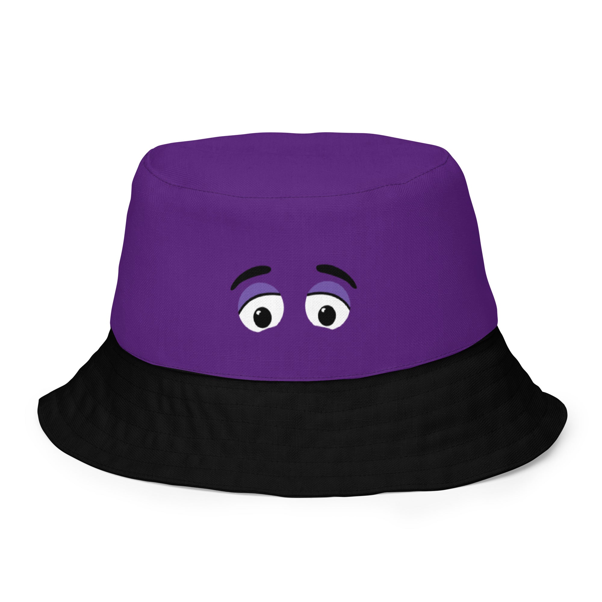 Reversible bucket hat with a purple top featuring cartoon eyes and a black brim, designed for casual wear and playful style.