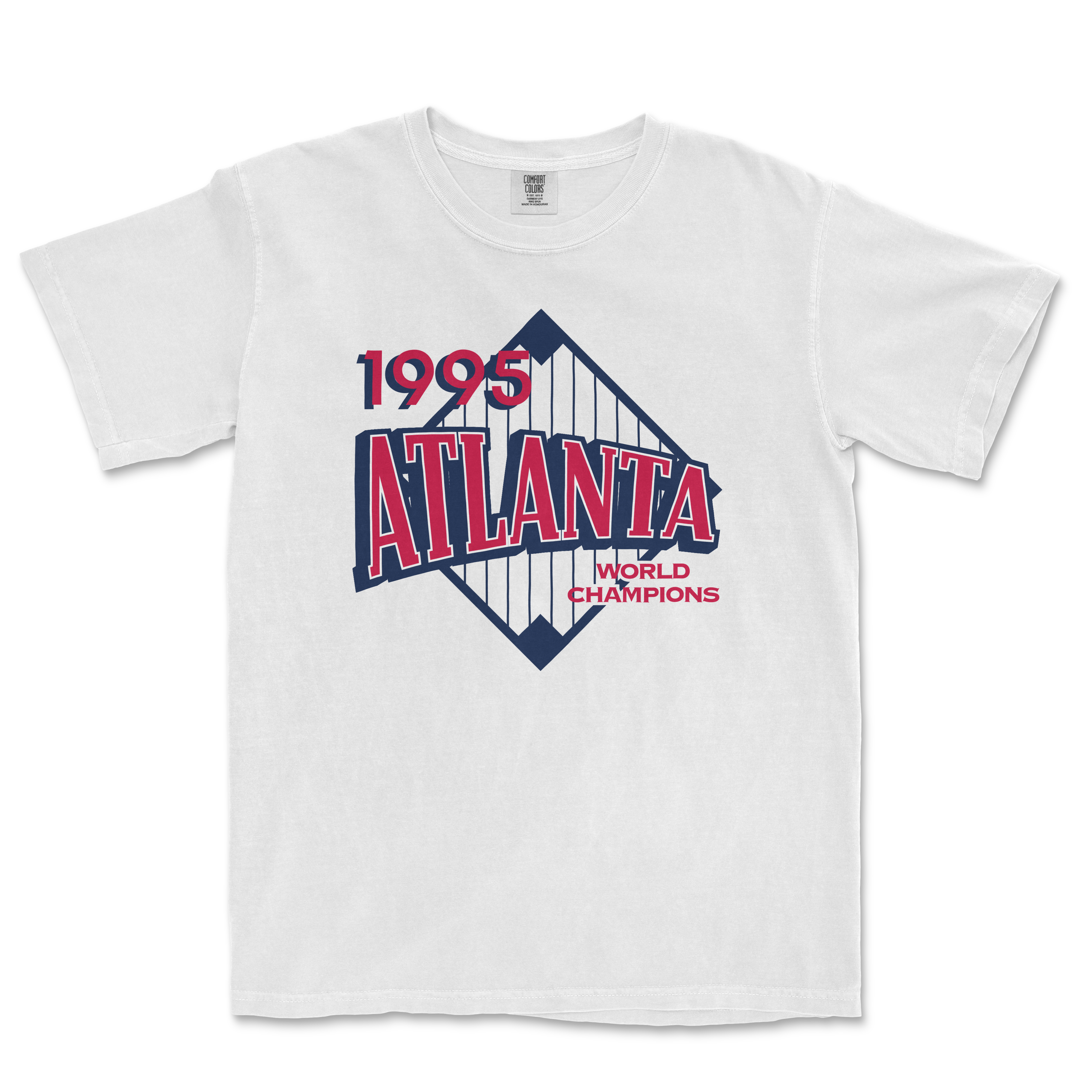 White Comfort Colors tee featuring a vintage 1995 Atlanta World Champions design with a stylized cityscape graphic.