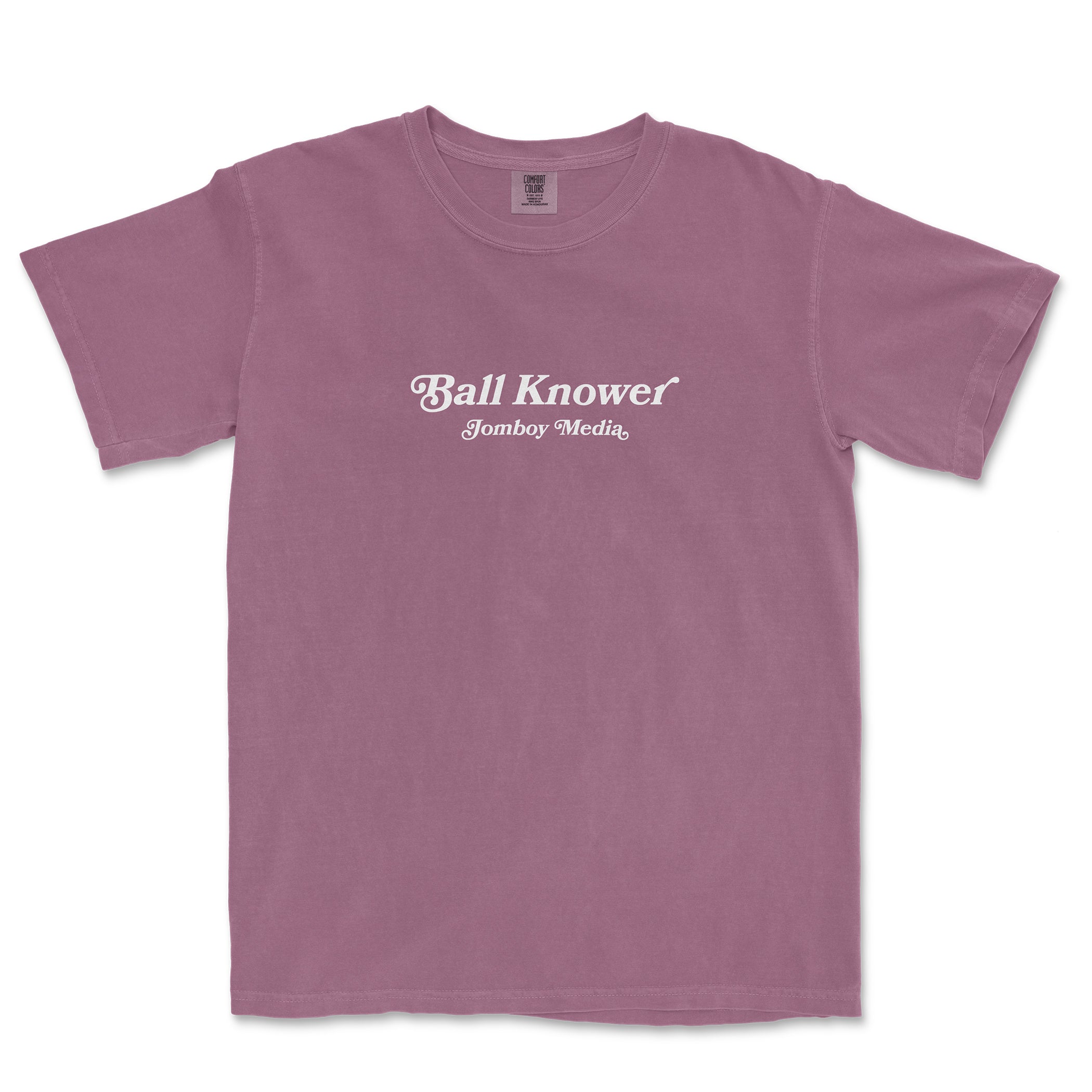 Pink Comfort Colors T-shirt with white "Ball Knower" and "Jomboy Media" text printed on the front.