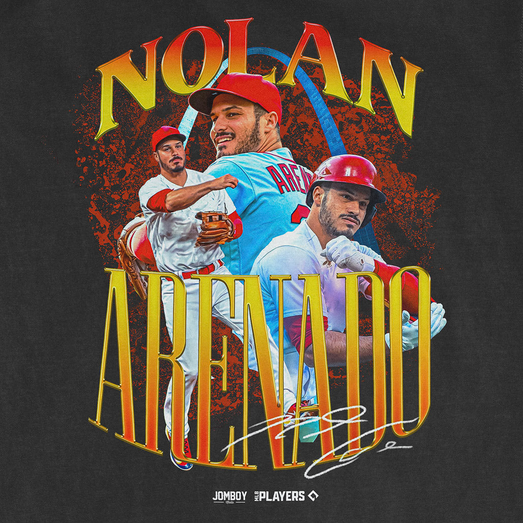 Close-up of a black Comfort Colors tee featuring Nolan Arenado's signature series design with images of him in baseball uniforms and bold colorful text.