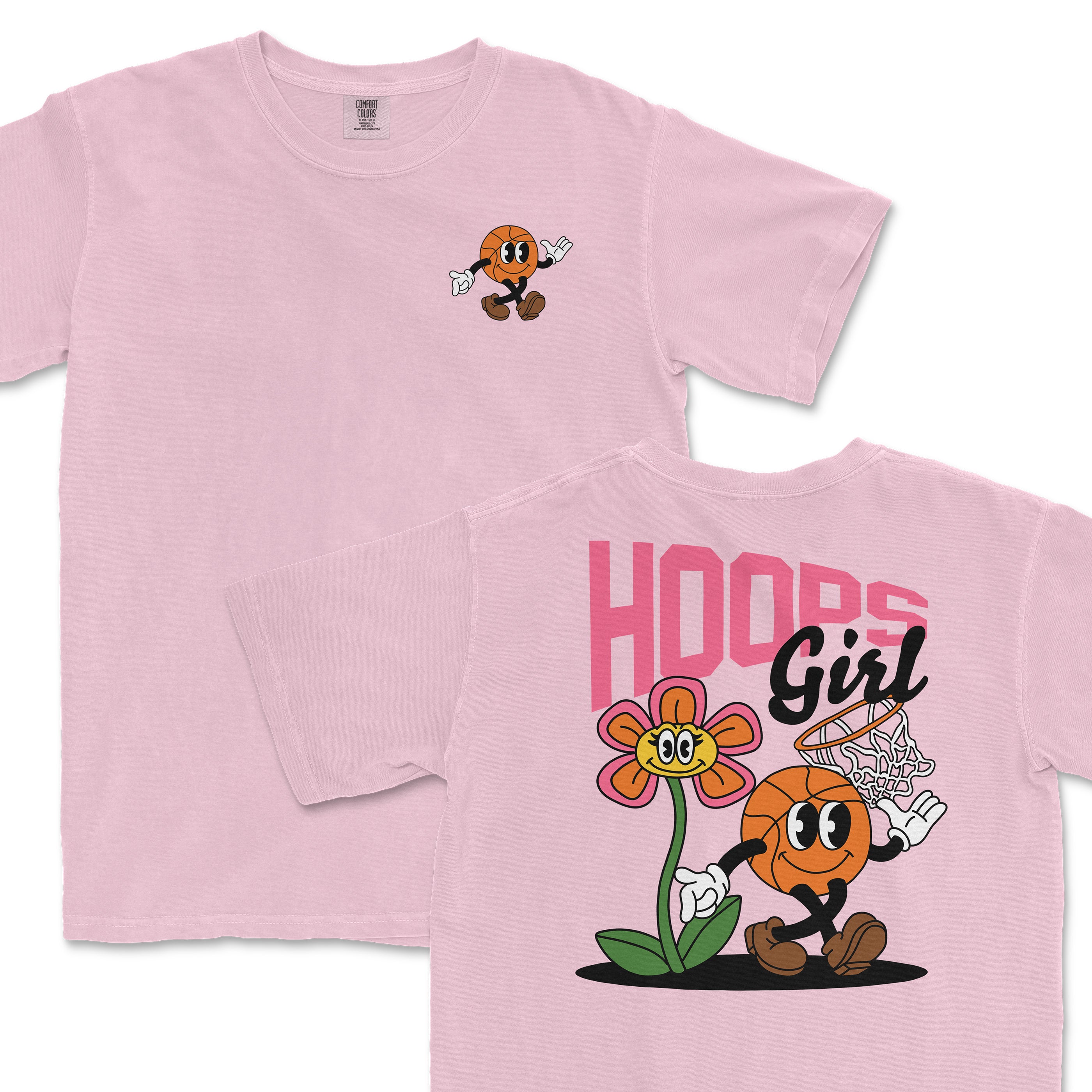 Pink Comfort Colors tee featuring a cartoon basketball character with hoop and flower graphics, labeled "Hoops Girl.