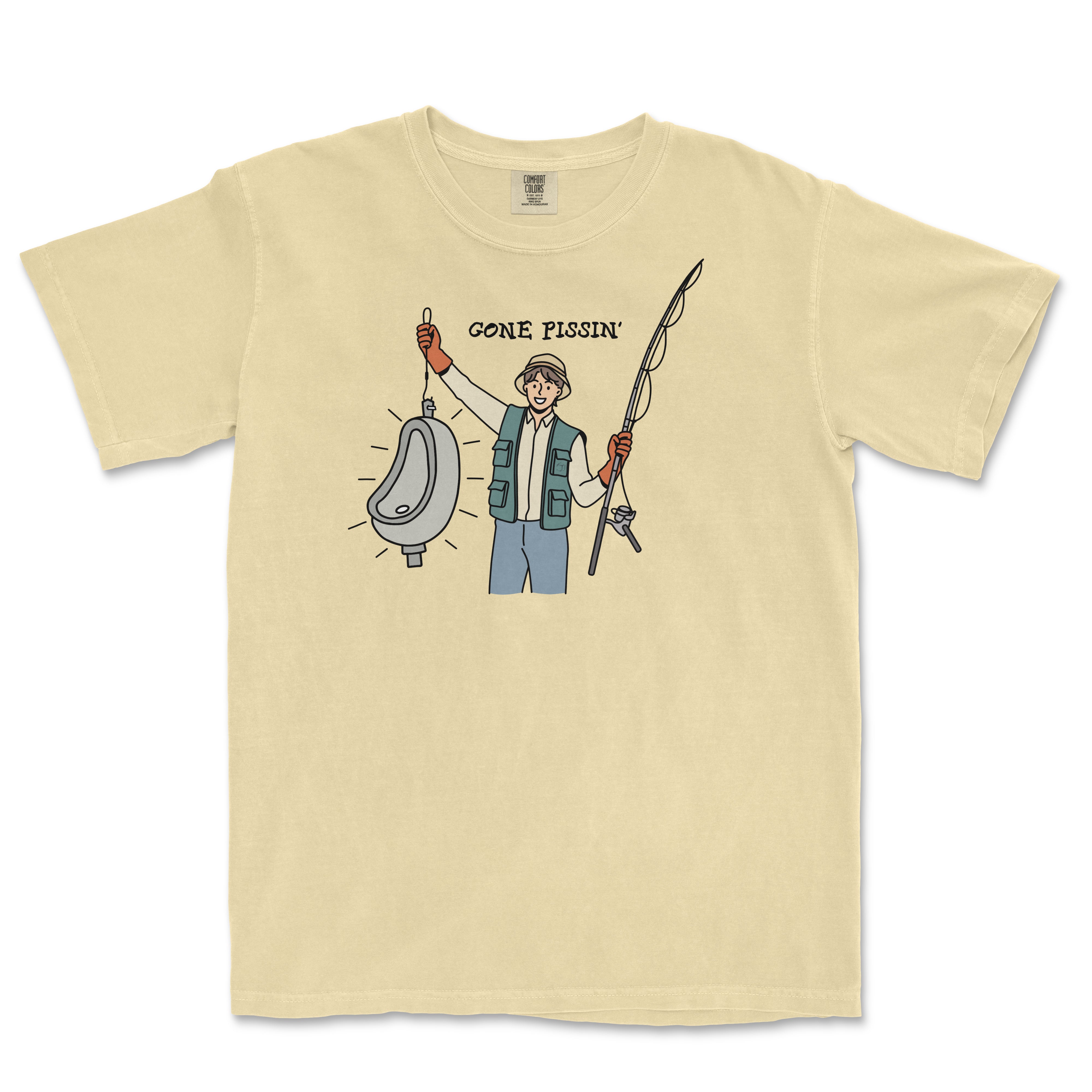 Illustration of a smiling person holding a fishing rod and a fish-shaped urinal, with the text "GONE PISSIN'" above, on a beige T-shirt.