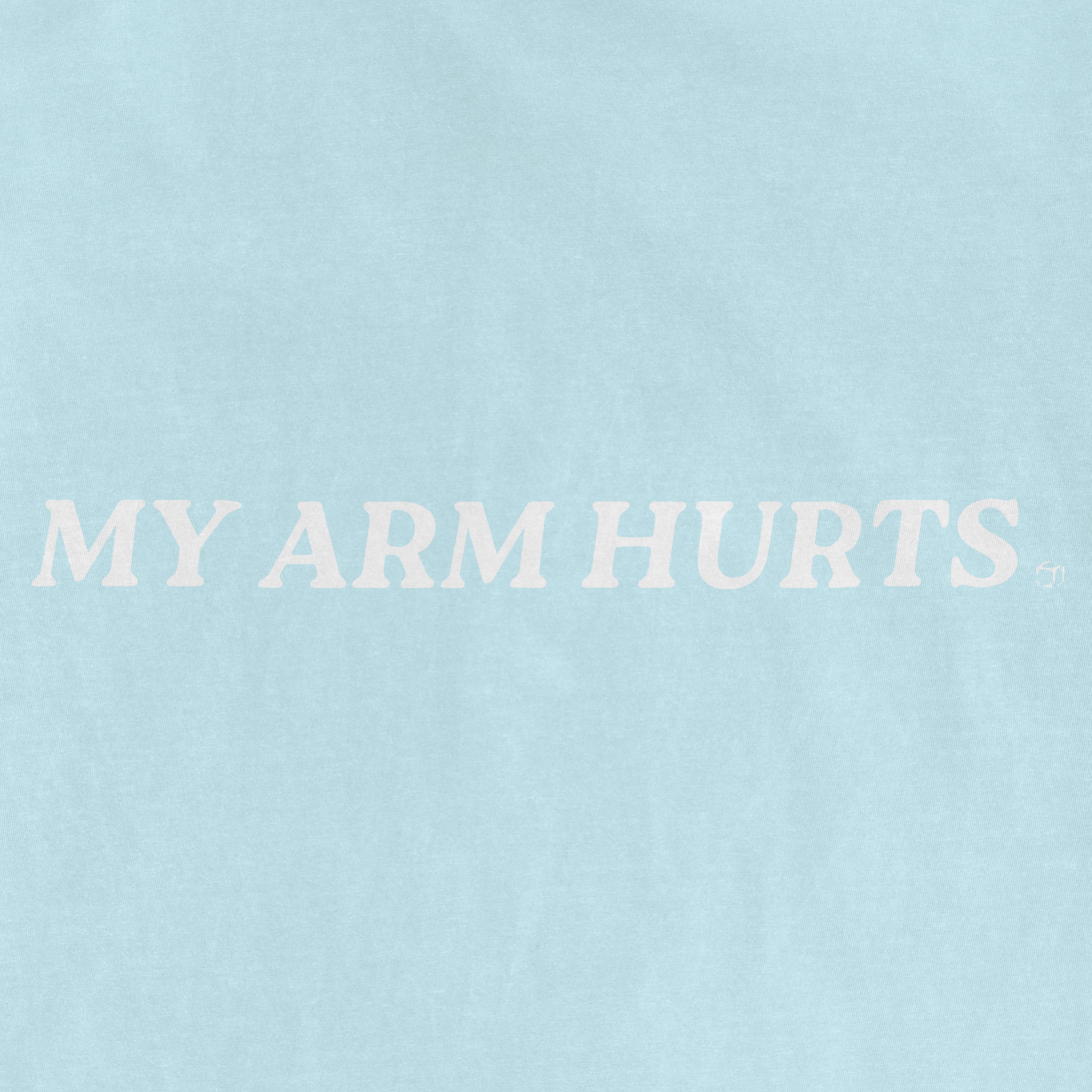 Light blue vintage T-shirt with white text that reads "MY ARM HURTS" across the front.