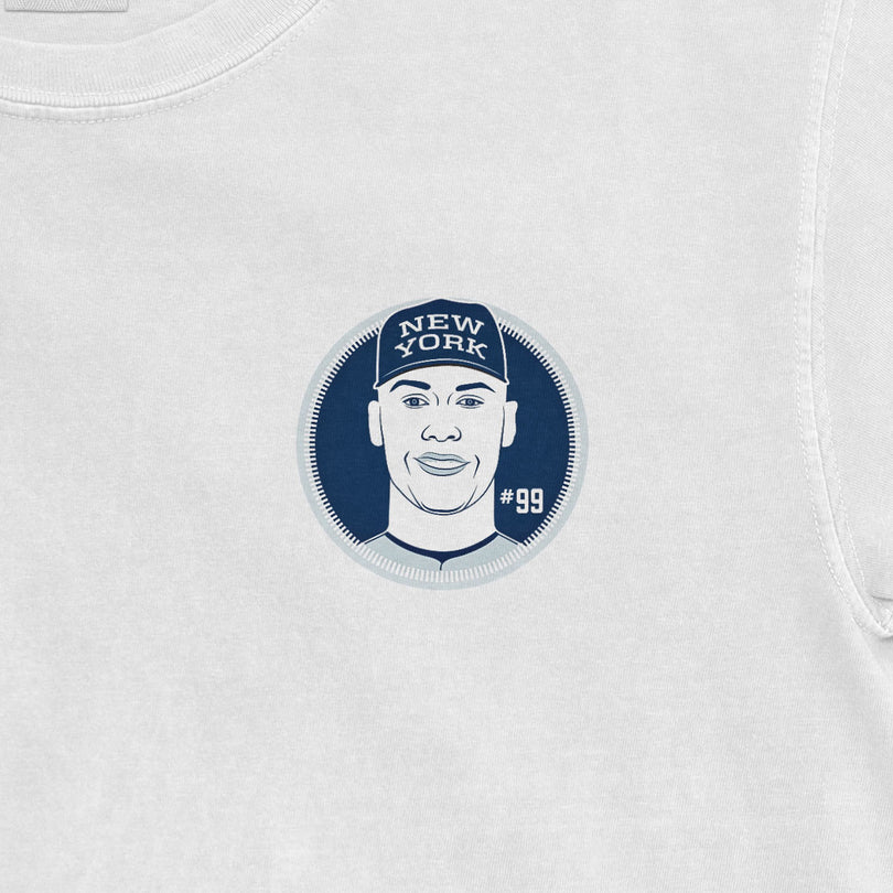 Aaron Judge shirsey graphic on a Comfort Colors T-shirt featuring a stylized portrait, "New York" cap, and "#99" number.