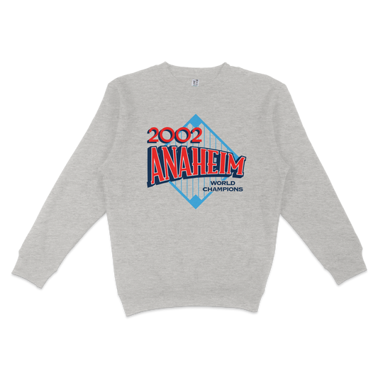 Gray crewneck sweatshirt featuring a vintage-style graphic celebrating the 2002 Anaheim World Champions, with bold red and blue text.