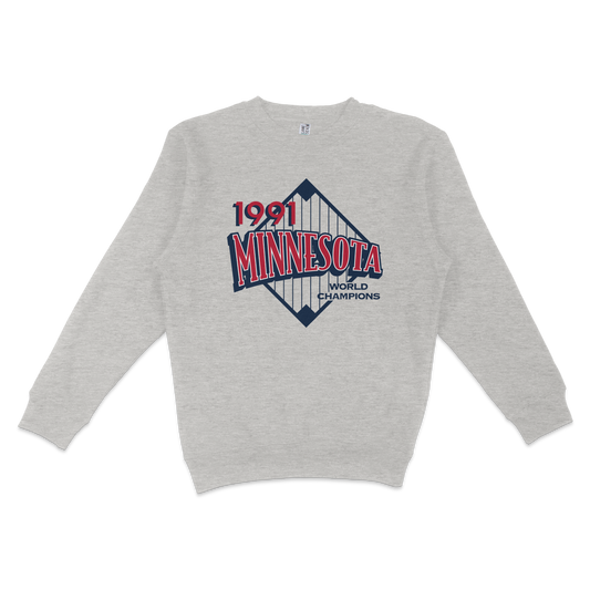 Gray crewneck sweatshirt featuring a Minnesota Vikings 1991 World Champions logo with a stylized bridge graphic.
