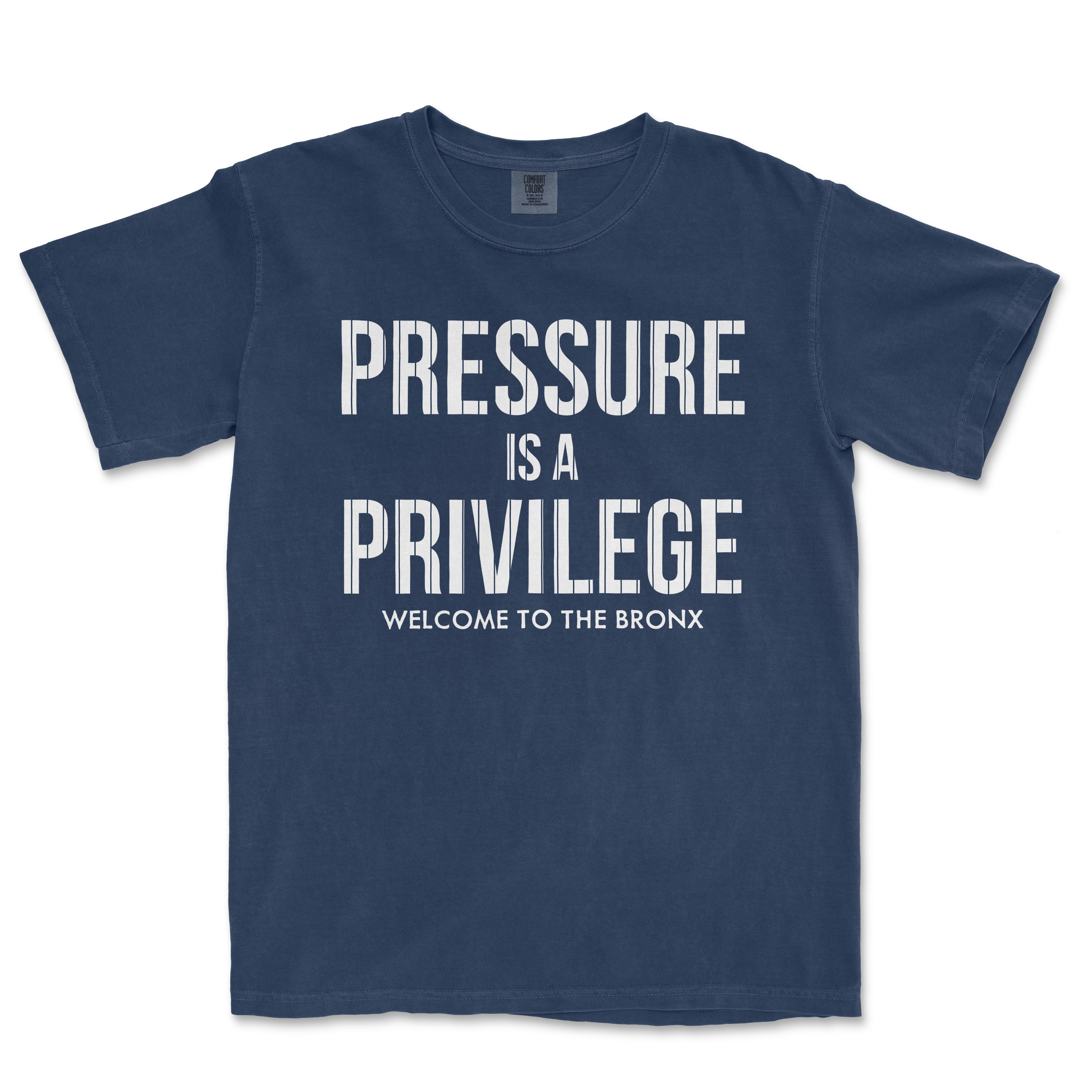 Blue T-shirt with white text that reads "Pressure is a Privilege. Welcome to the Bronx.