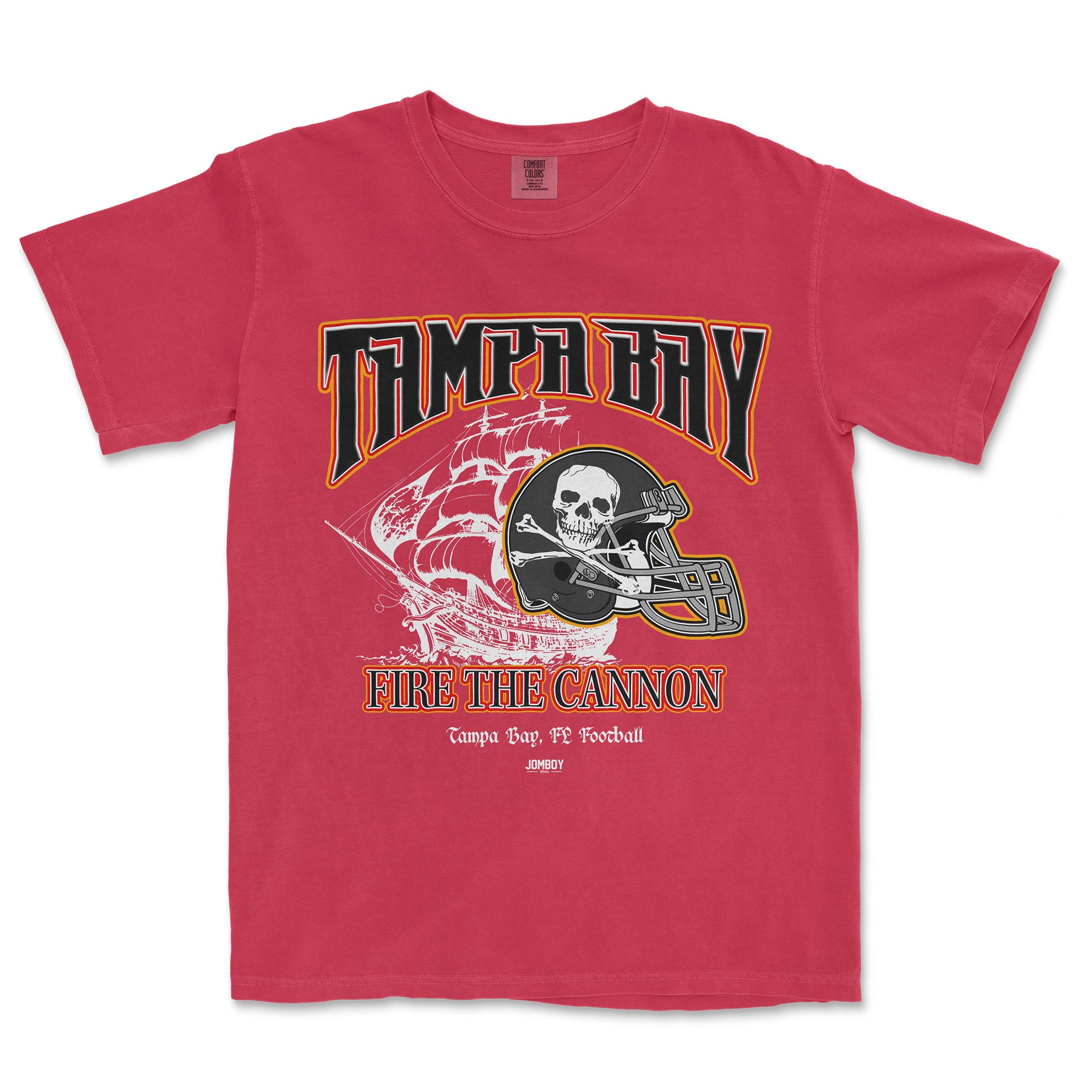 Red Comfort Colors® vintage tee featuring a pirate ship, skull with a football helmet, and bold "TAMPA BAY" and "FIRE THE CANNON" text.