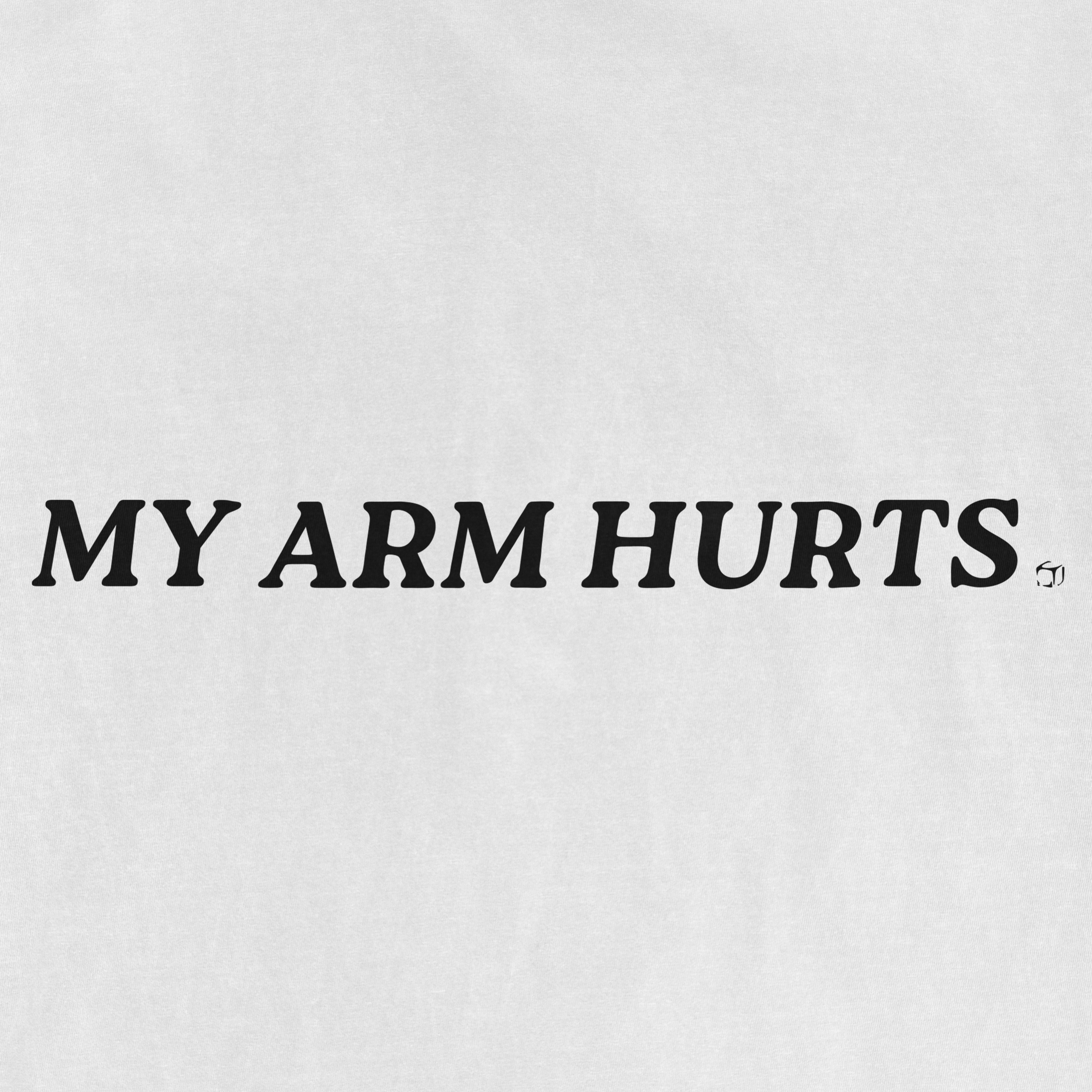 Text on a light-colored vintage tee reads "MY ARM HURTS" in bold black letters.
