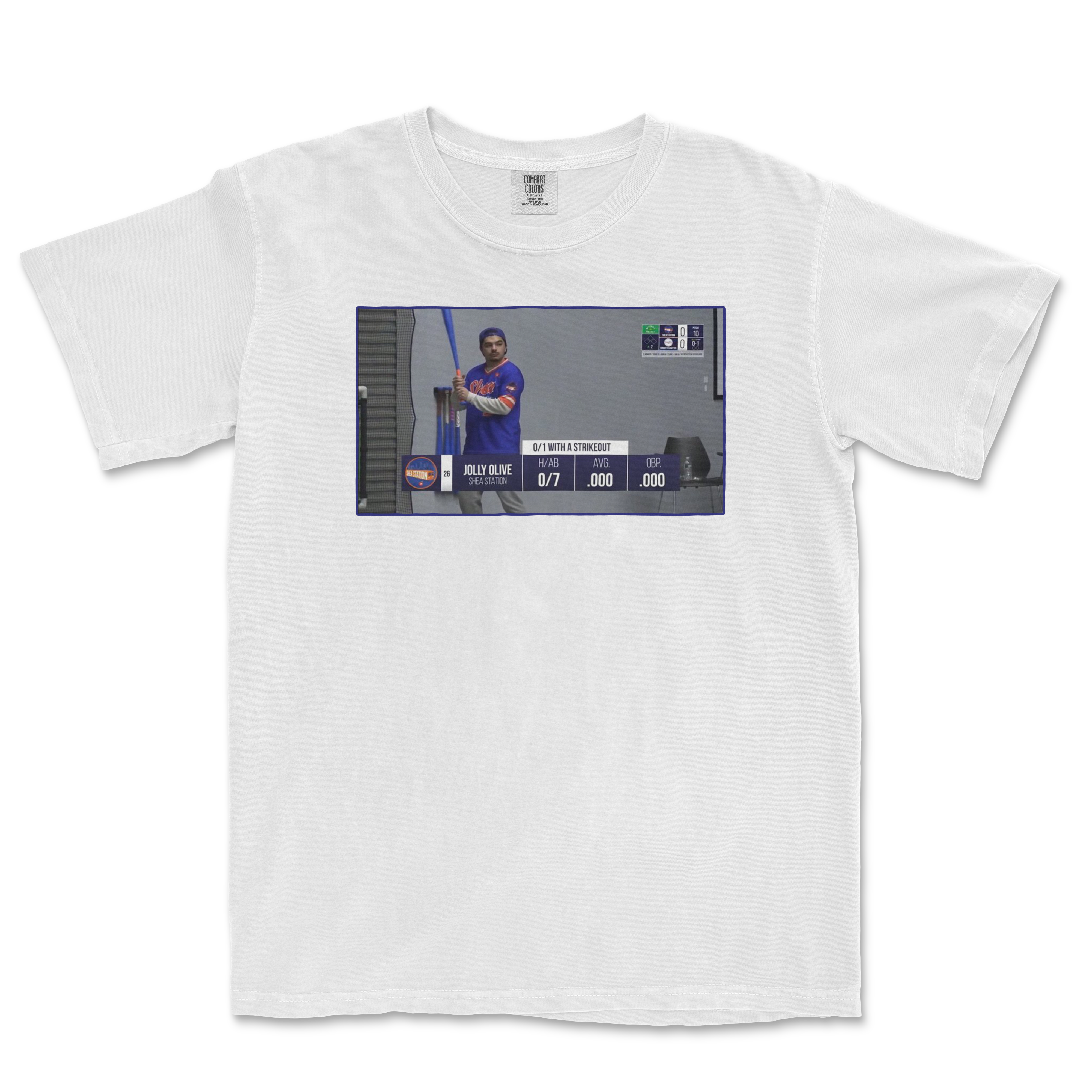 White t-shirt featuring a graphic of a player with the text "Jolly Olive 0-7" and stats displayed on a scoreboard.