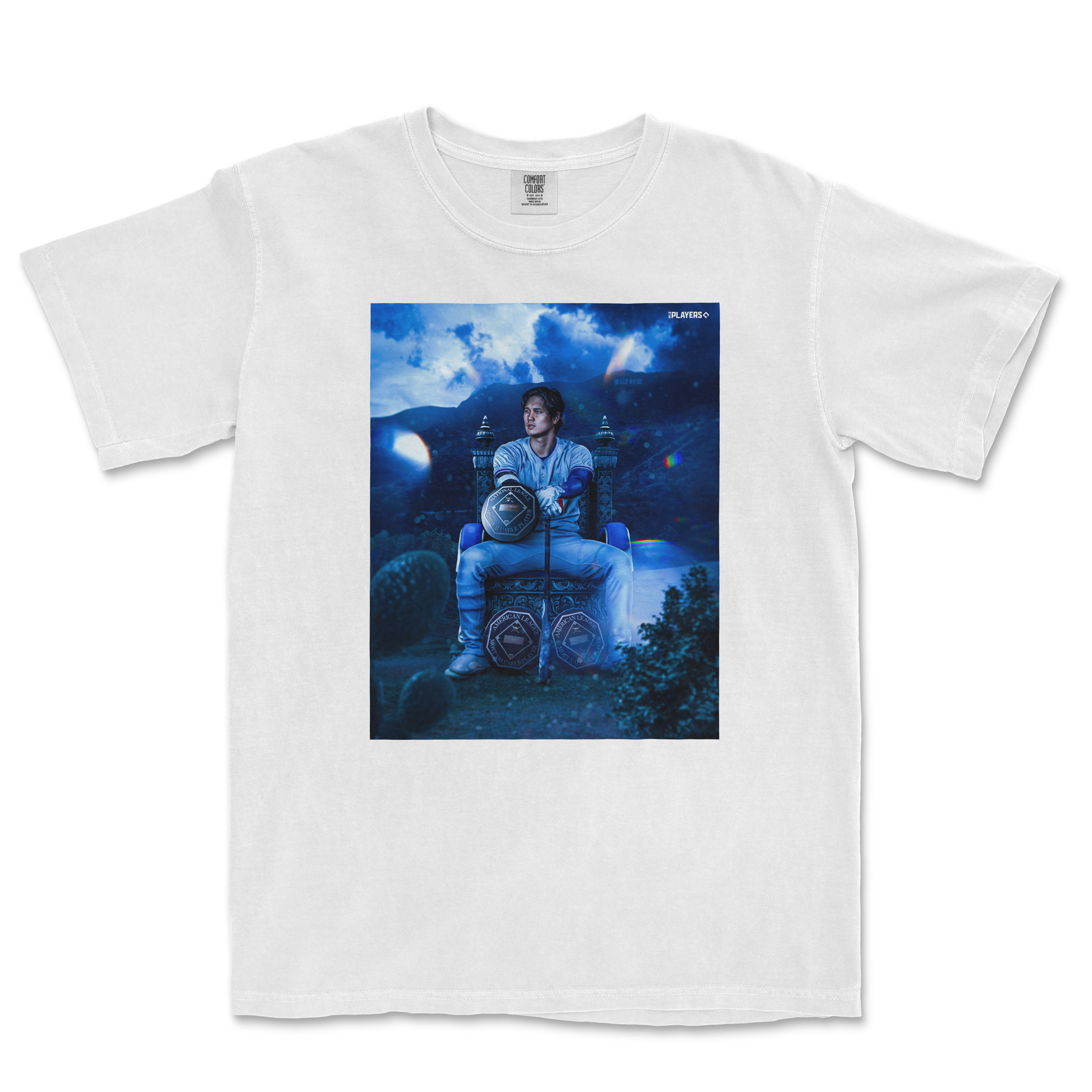 White T-shirt featuring a digital artwork of Shohei Ohtani sitting on a throne with MVP medals, set against a dark, fantasy-inspired landscape.