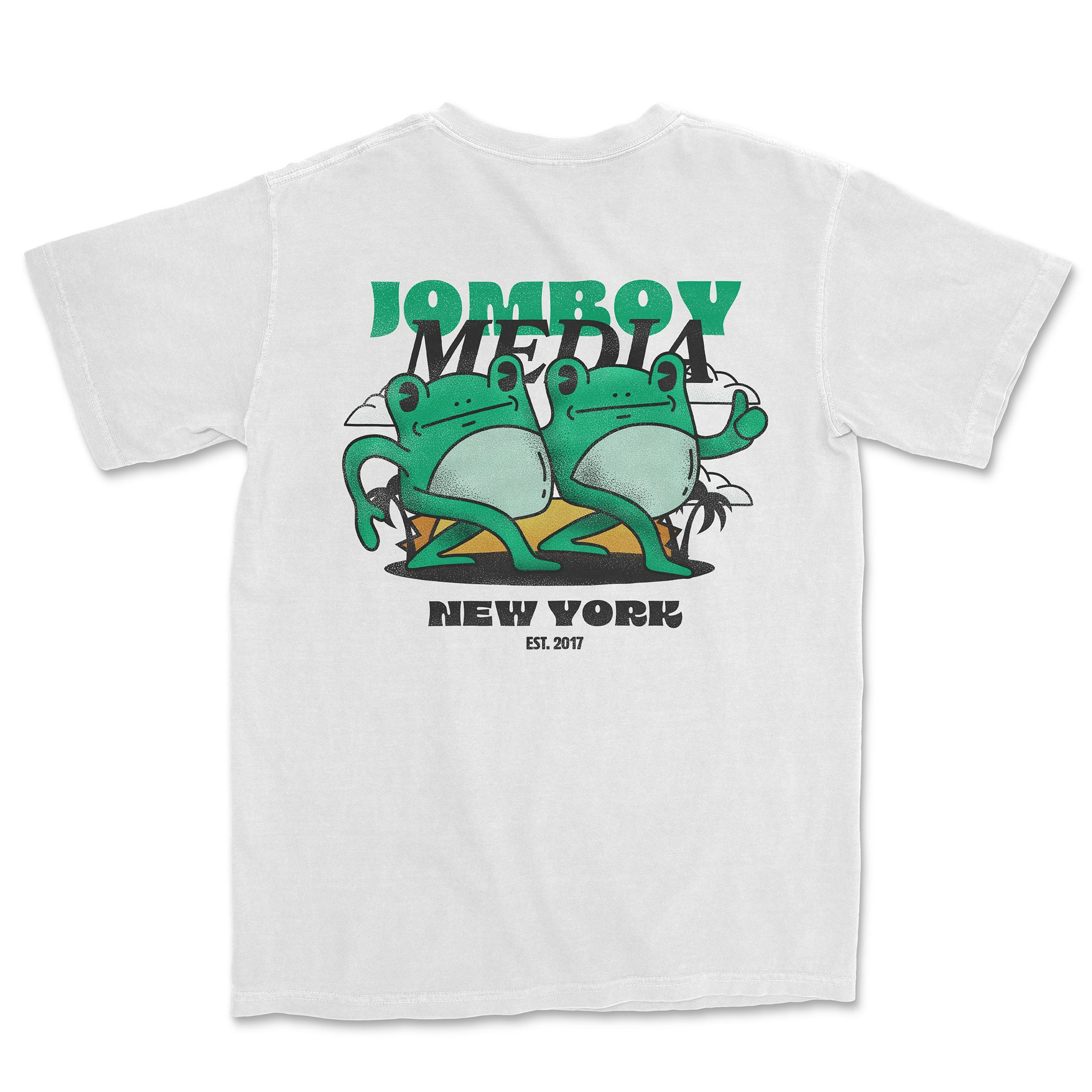 White Comfort Colors T-shirt featuring a graphic of two frogs with "Jumbo Media" text, "New York" and "Est. 2017" underneath.