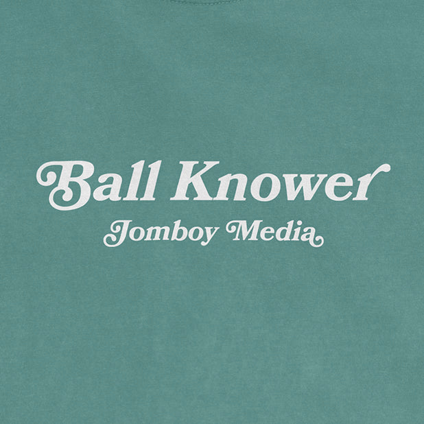 Green Comfort Colors T-shirt featuring white text that reads "Ball Knower" and "Jomboy Media" in a stylish font.