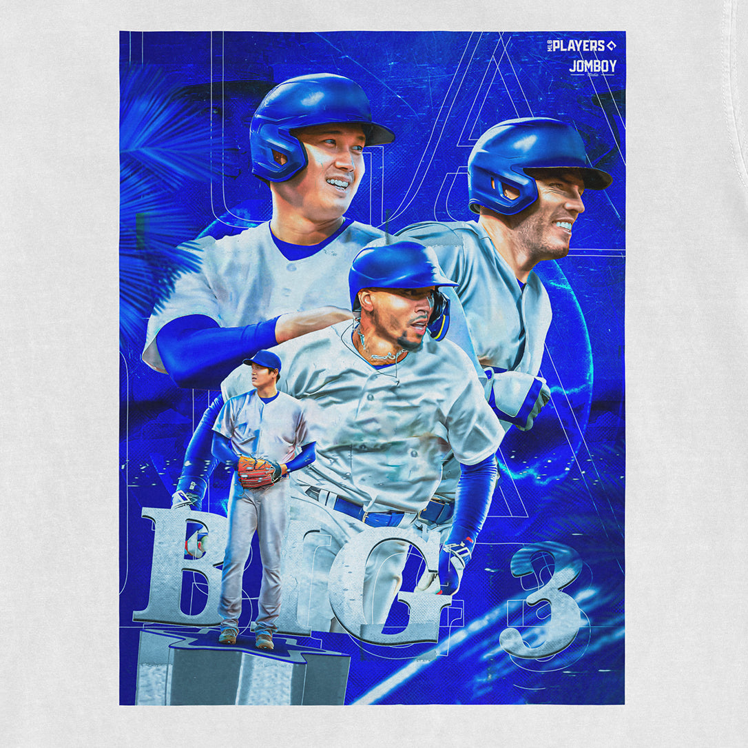 Comfort Colors tee featuring a vibrant blue graphic of three baseball players from the Los Angeles Big 3 team, with dynamic background elements.