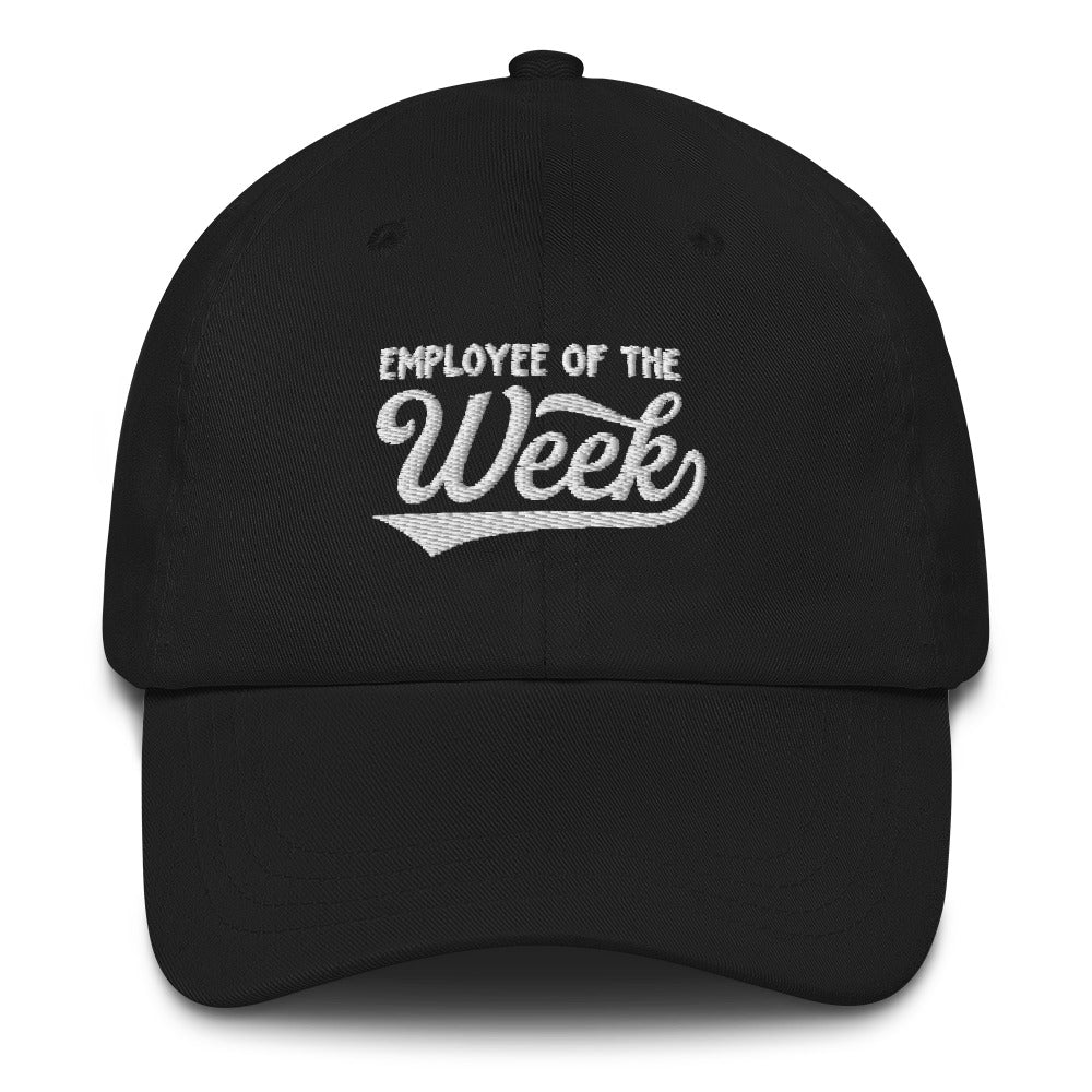 Black dad hat with white embroidered text reading "Employee Of The Week" on the front, featuring a curved brim and adjustable strap.