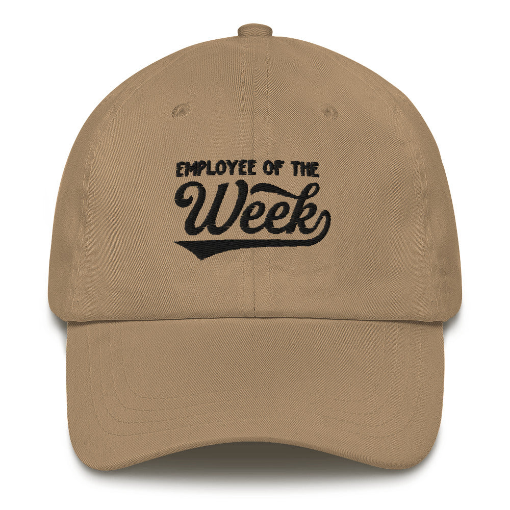 Beige dad hat with "Employee of the Week" embroidered in black on the front, featuring a curved brim and adjustable strap.