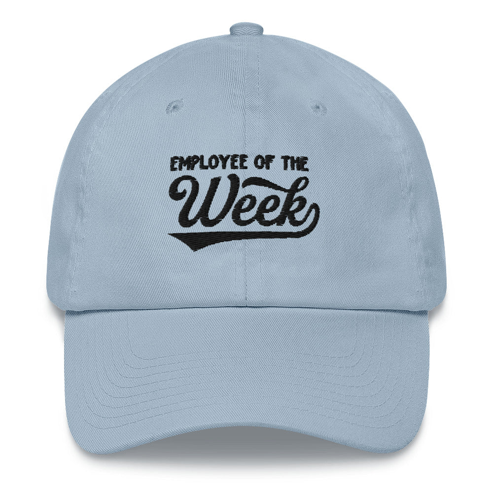 Light blue dad hat with "Employee of the Week" embroidered in black on the front. Classic curved brim and adjustable strap.