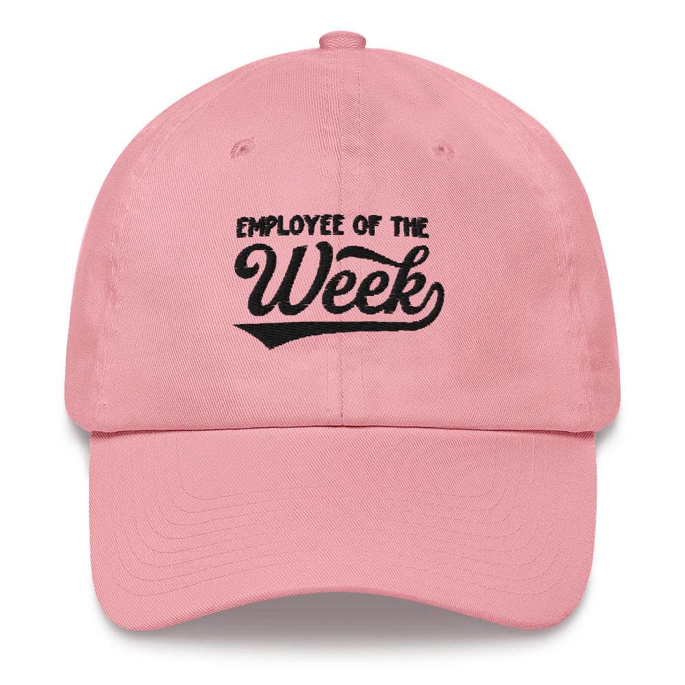 Pink dad hat with black embroidered text reading "Employee Of The Week" on the front.
