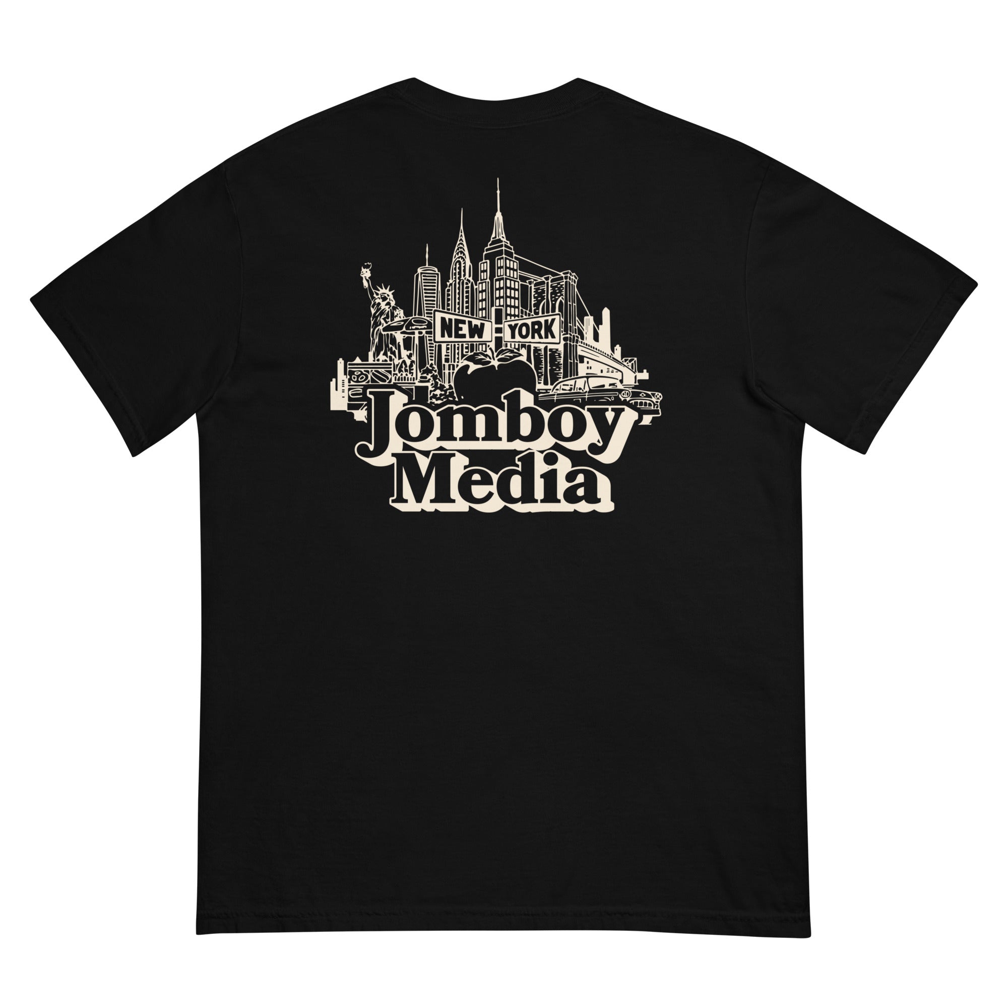 Black T-shirt featuring a white line art illustration of New York City skyline with iconic buildings, the Statue of Liberty, and a vintage car, along with the text "Jamboy Media" and "New York.